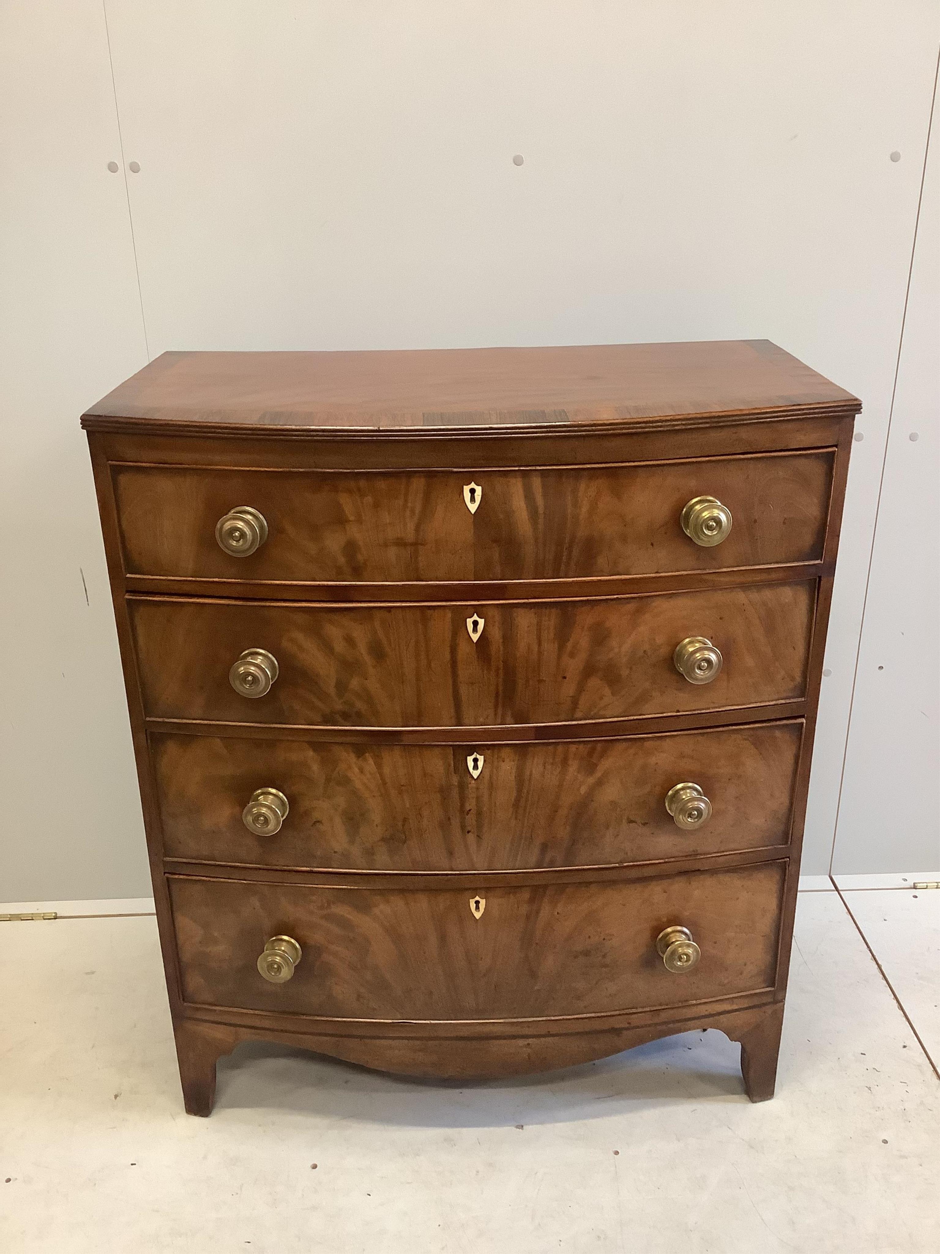 A Regency rosewood banded mahogany bowfront chest of drawers, width 90cm, depth 48cm, height 107cm. Condition - good